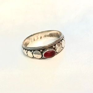 Sterling silver ring with garnet stone